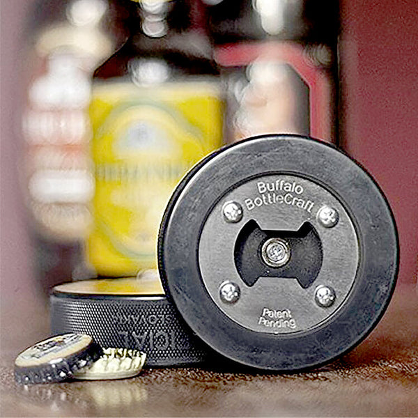 DÉCAPSULEUR PALET DE HOCKEY